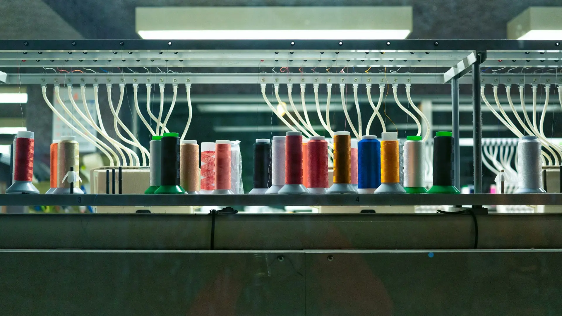 a row of tubes on a shelf